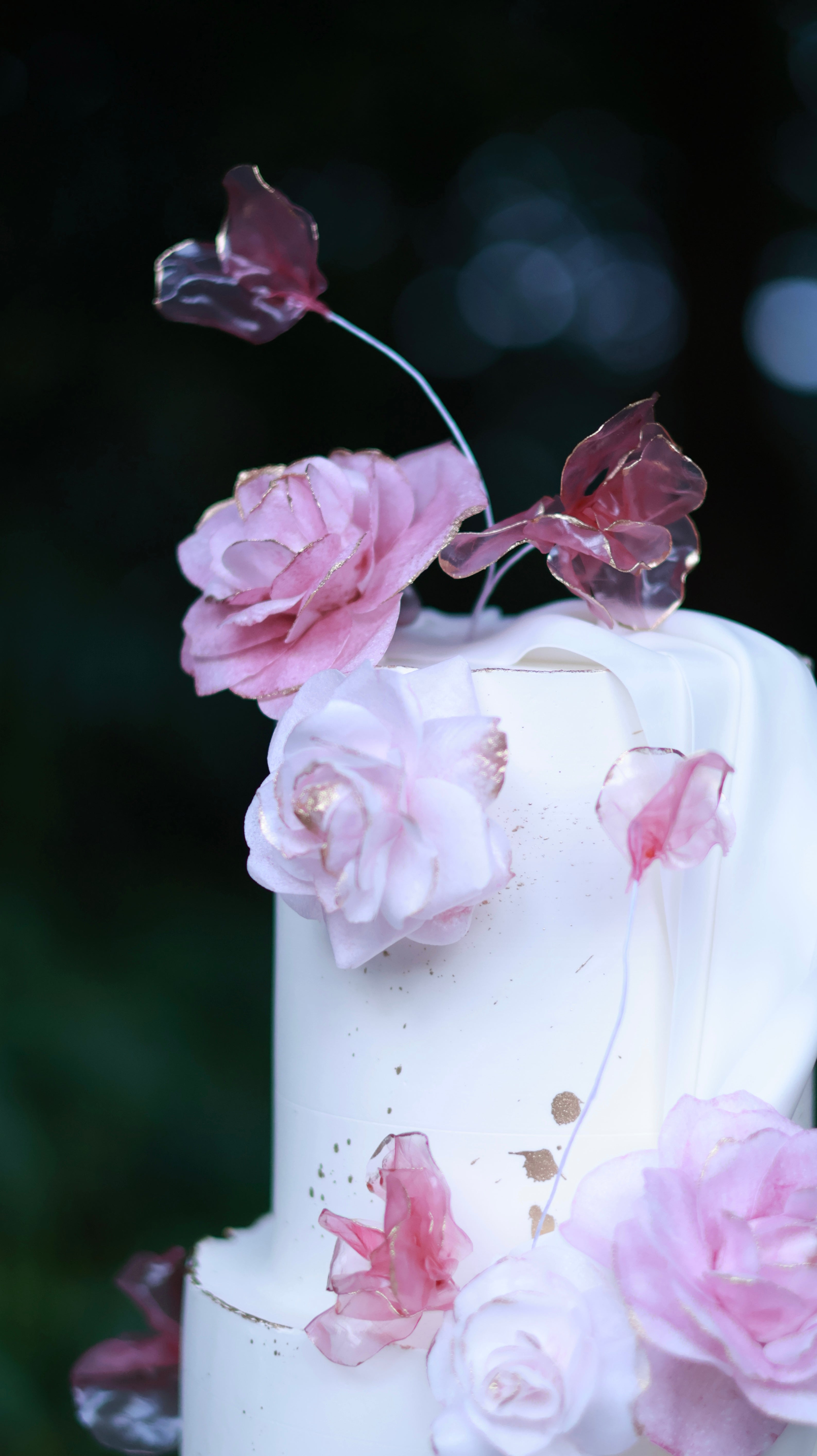 Pink sugar flower wedding cake