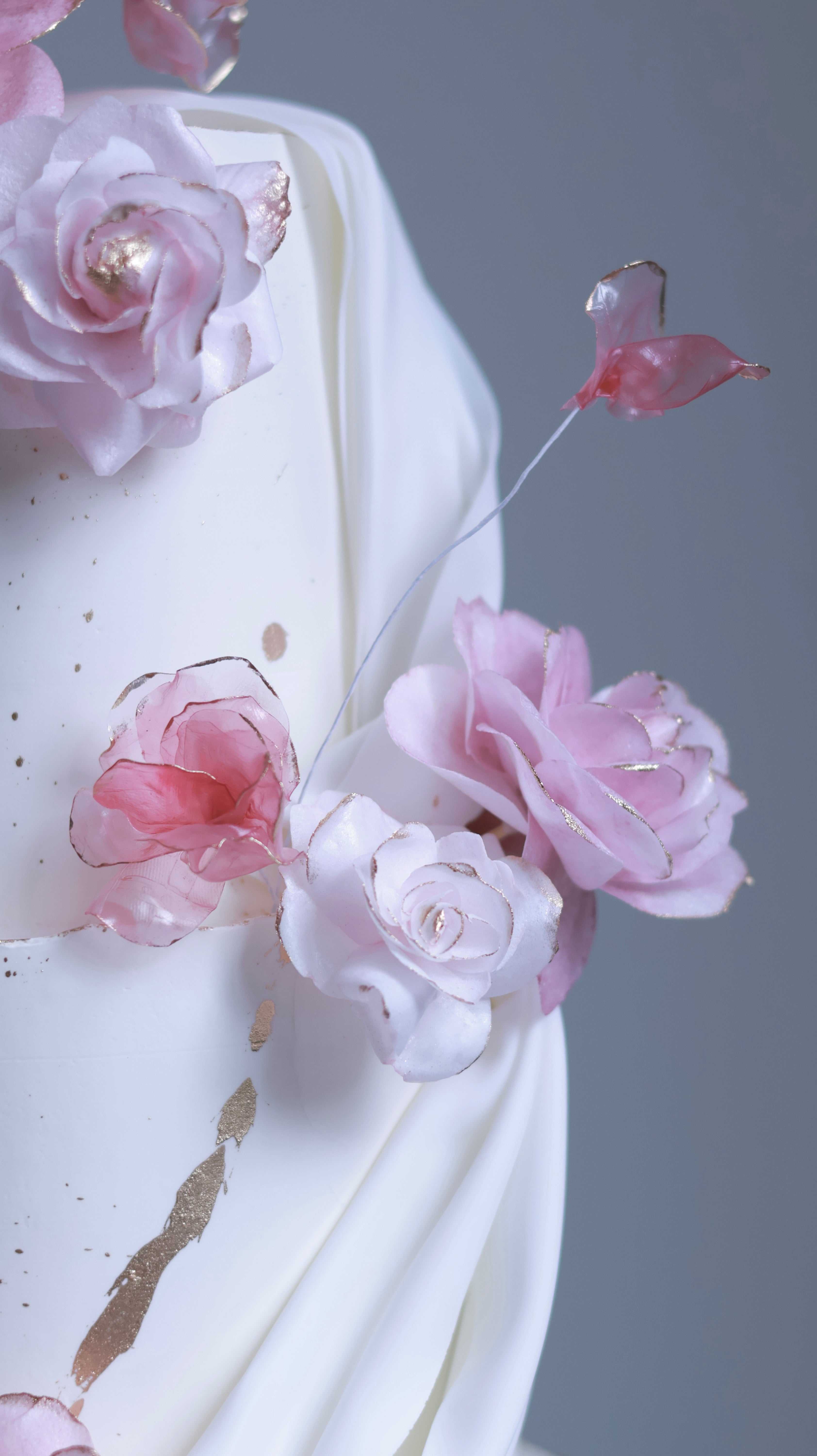Pink sugar flower wedding cake