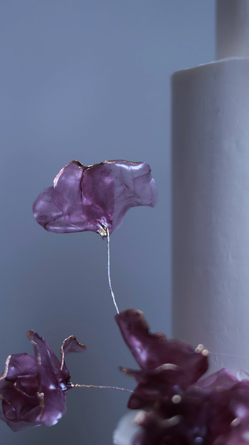 Purple sugar flower wedding cake