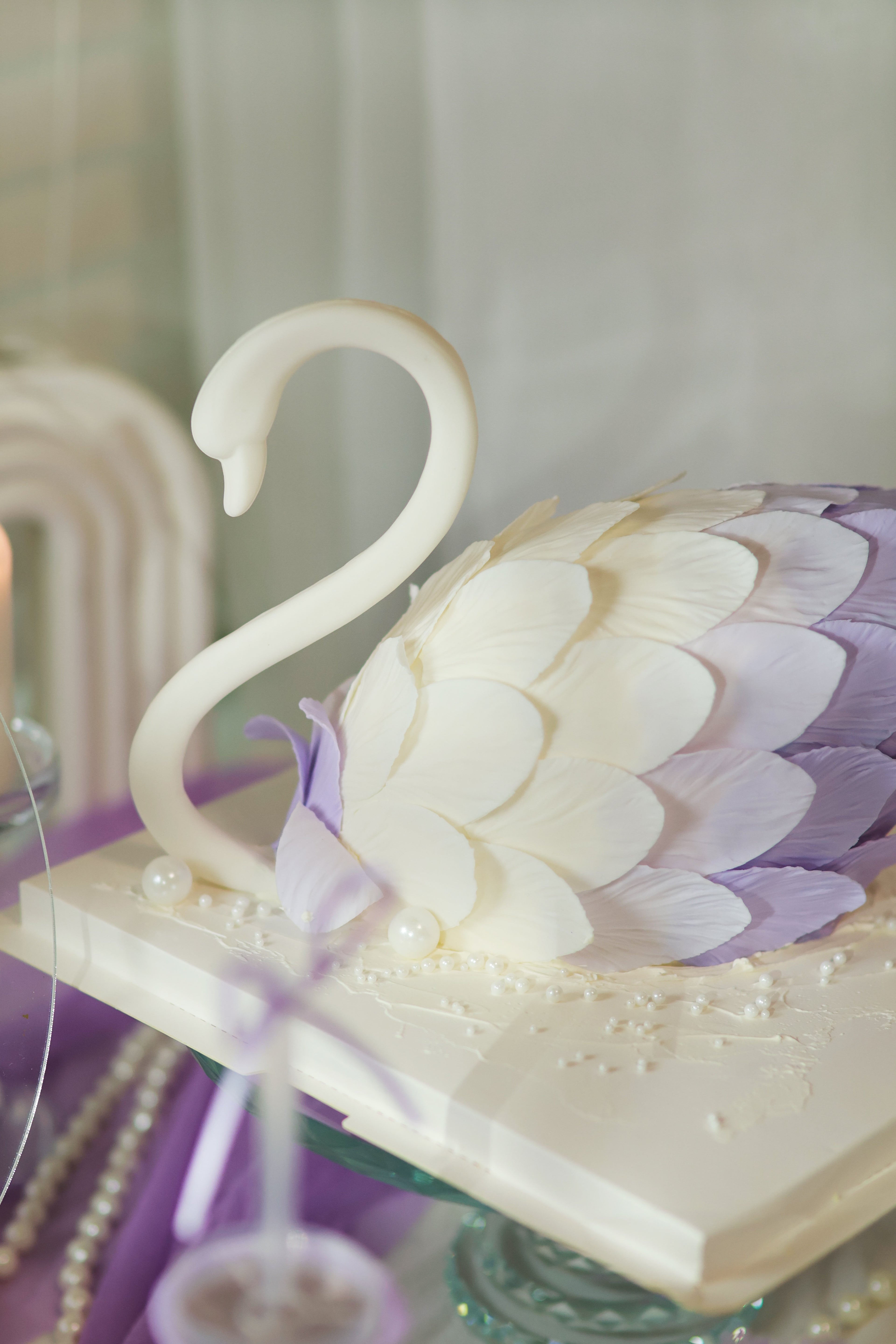 Purple swan and dessert table