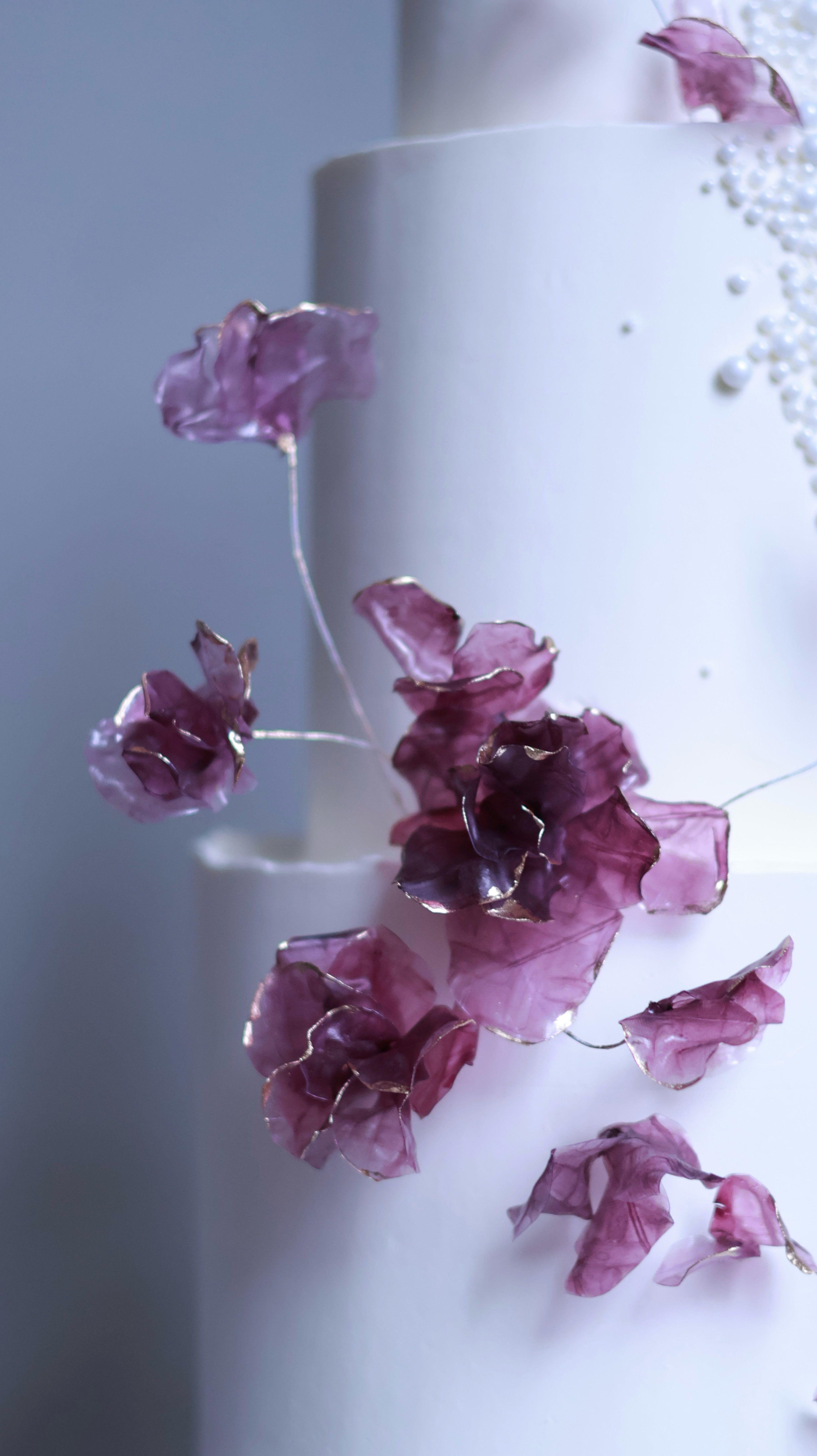 Purple sugar flower wedding cake