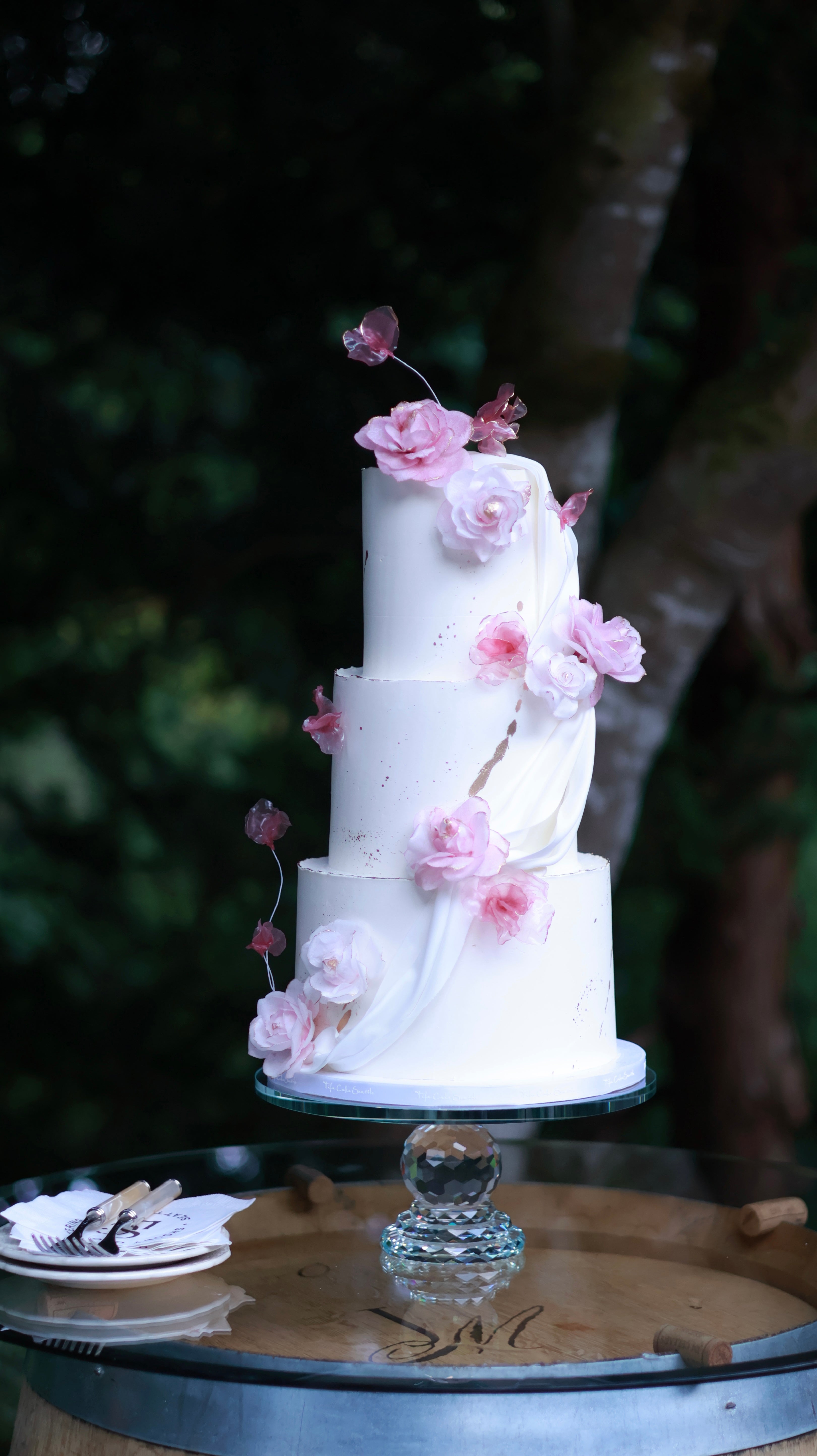 Pink sugar flower wedding cake